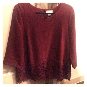 Maroon blouse with flowery lace trim